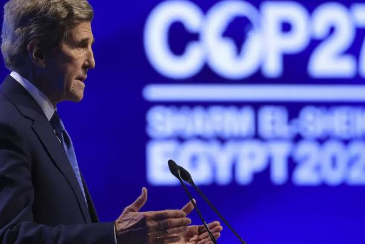 photo of John Kerry speaking at International Climate Summit